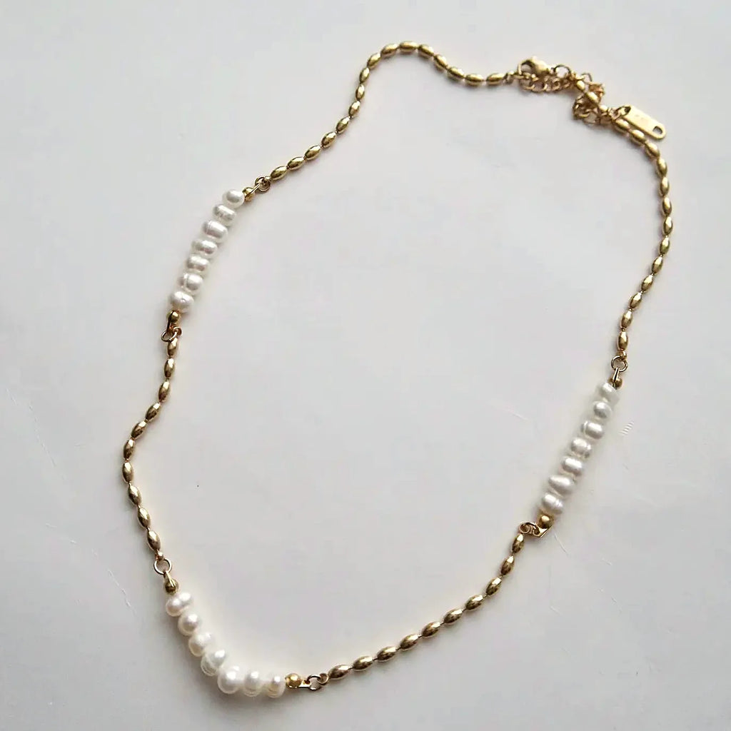 Pearl and gold-plated link choker necklace shown at full length