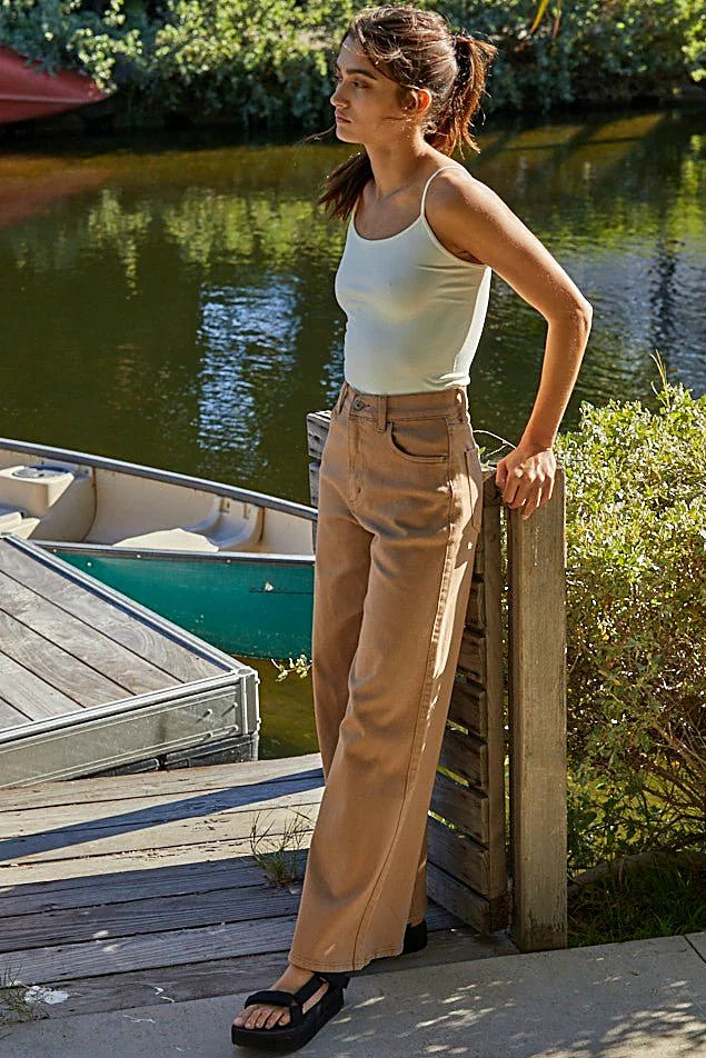 The full length hem of the black cami
