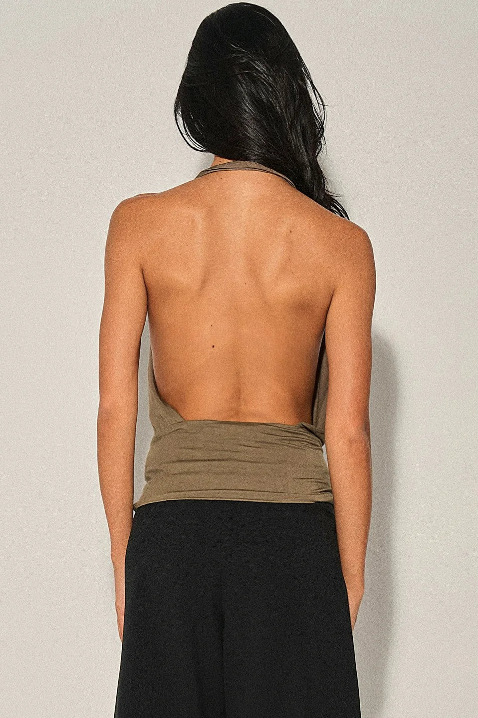 Back view showing the open back of the halter top