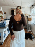 Brown long sleeve knit top with a keyhole opening at the neck