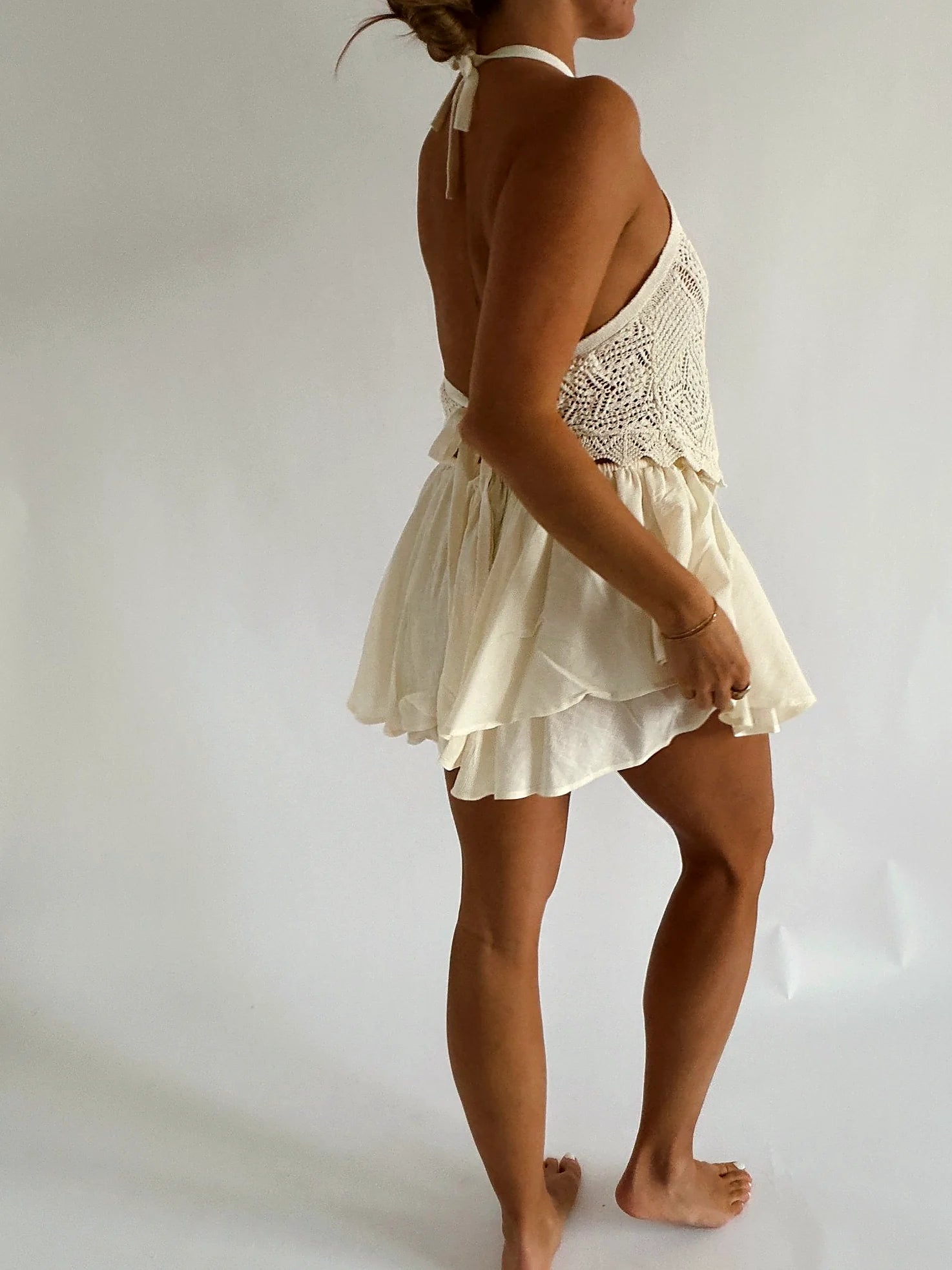 Back view showing the open back of the crochet top