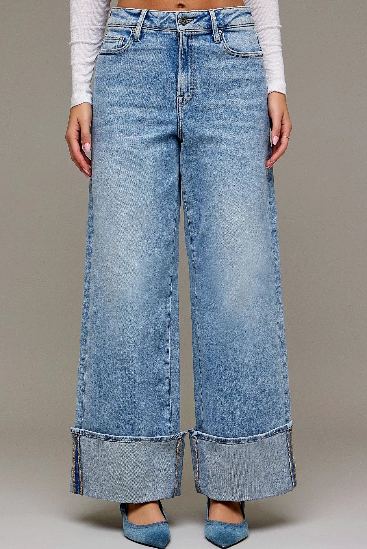 Close view of the cuffed hem at the ankle