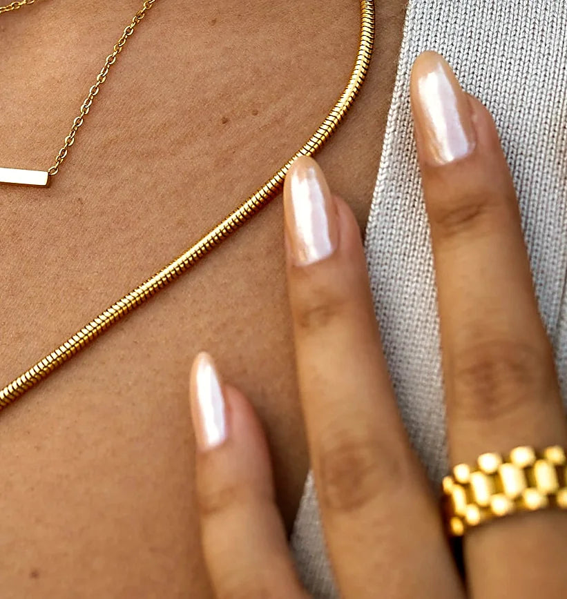Close view of the links in the gold-plated chain