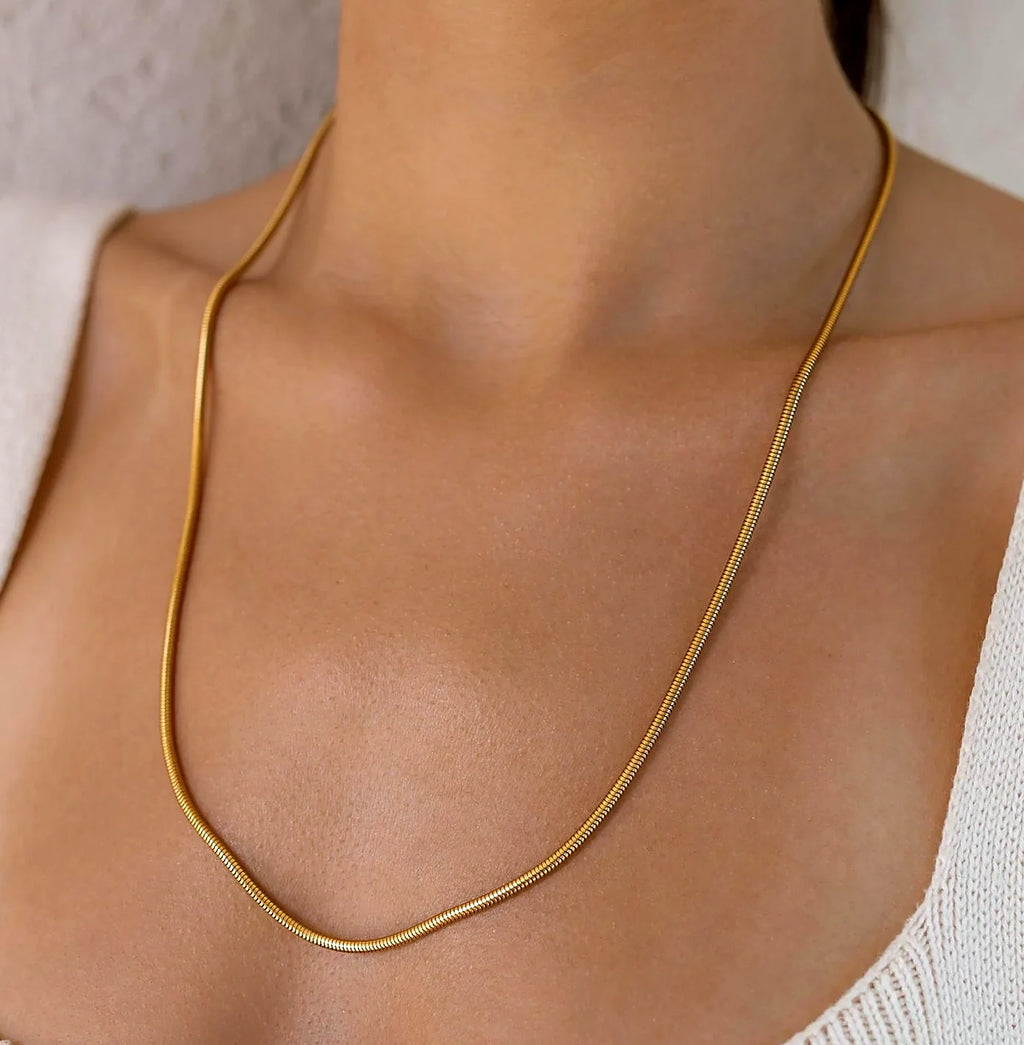 Long gold-plated chain necklace shown at full length